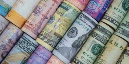 أسعار العملات الأجنبية والعربية اليوم الأحد في بنكي الأهلي ومصر
